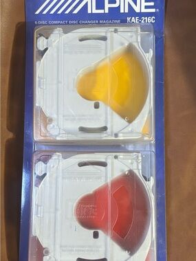 Alpine KAE-216C 6-Disc CD Changer Magazines in Yellow and Red